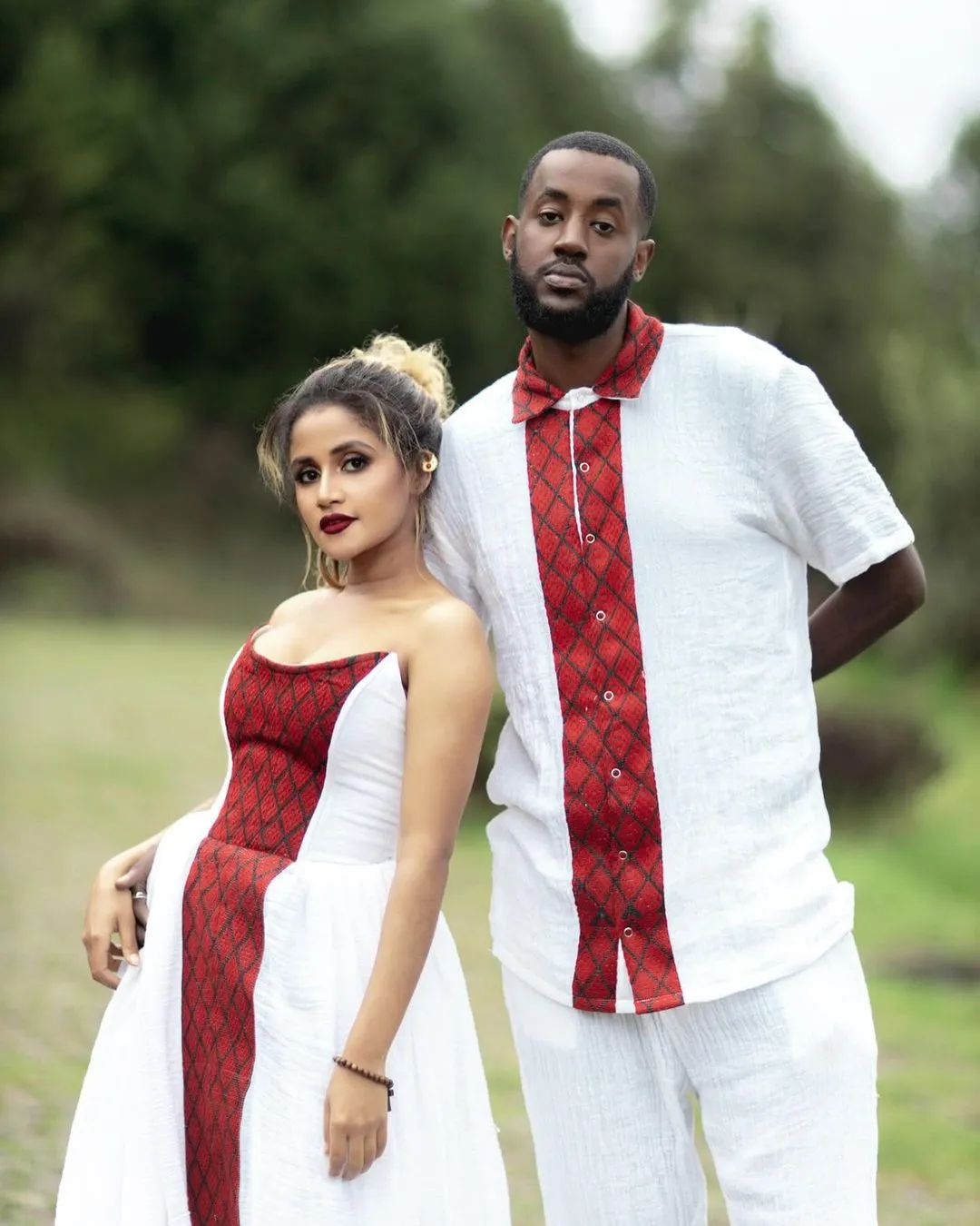 Captivating Red Matching Habesha Couples Outfit: Elegant Look with Traditional Ethiopian Couples Attire