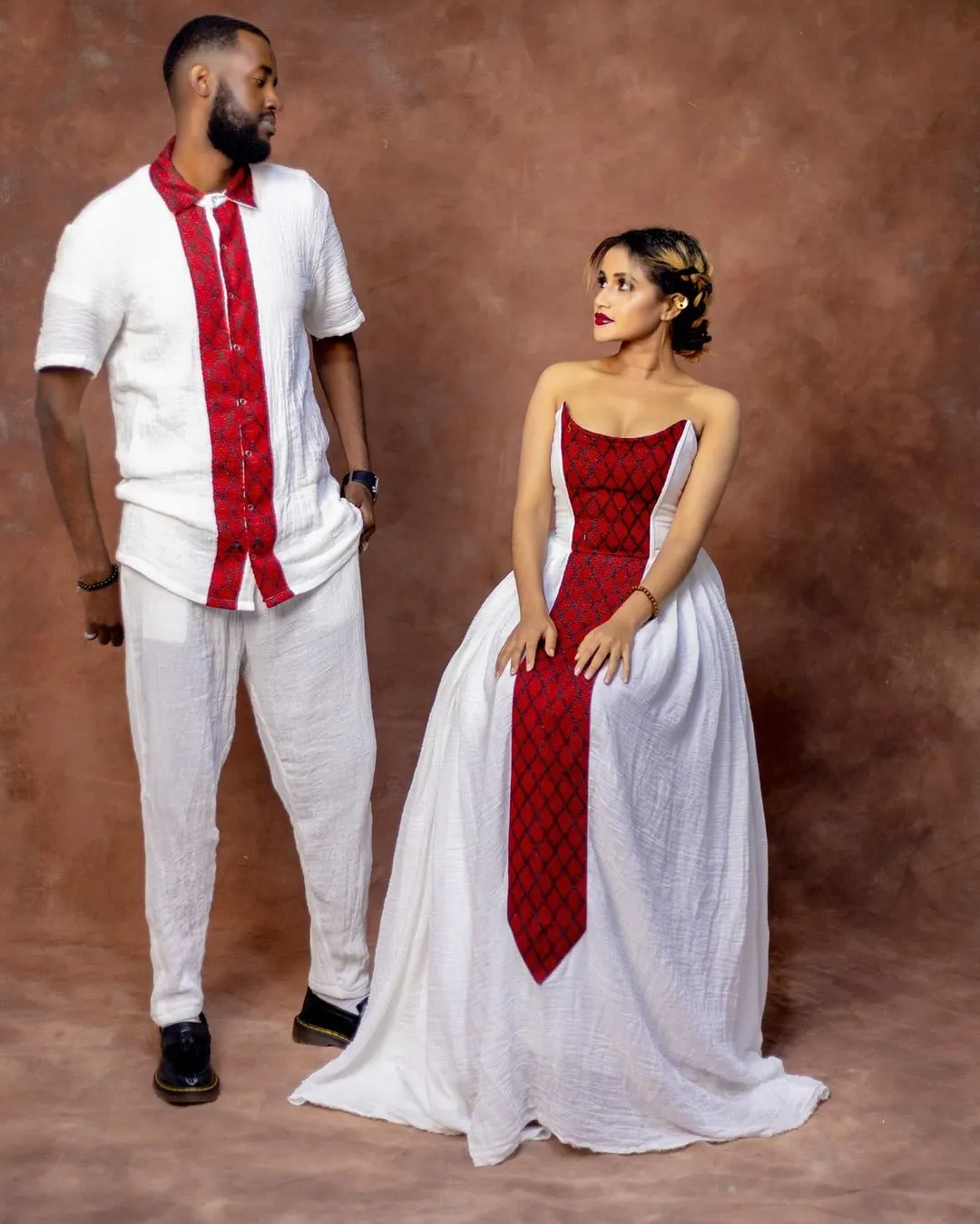 Captivating Red Matching Habesha Couples Outfit: Elegant Look with Traditional Ethiopian Couples Attire