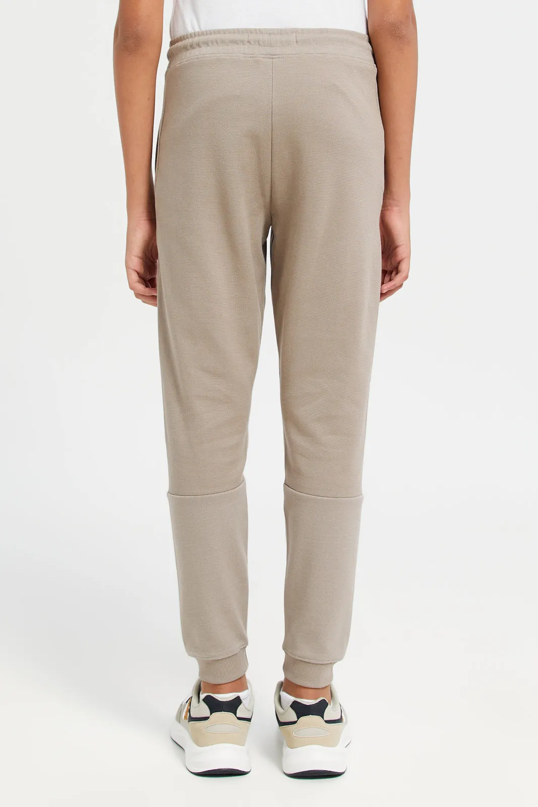 Senior Boys Beige Cut And Sew Active Pants