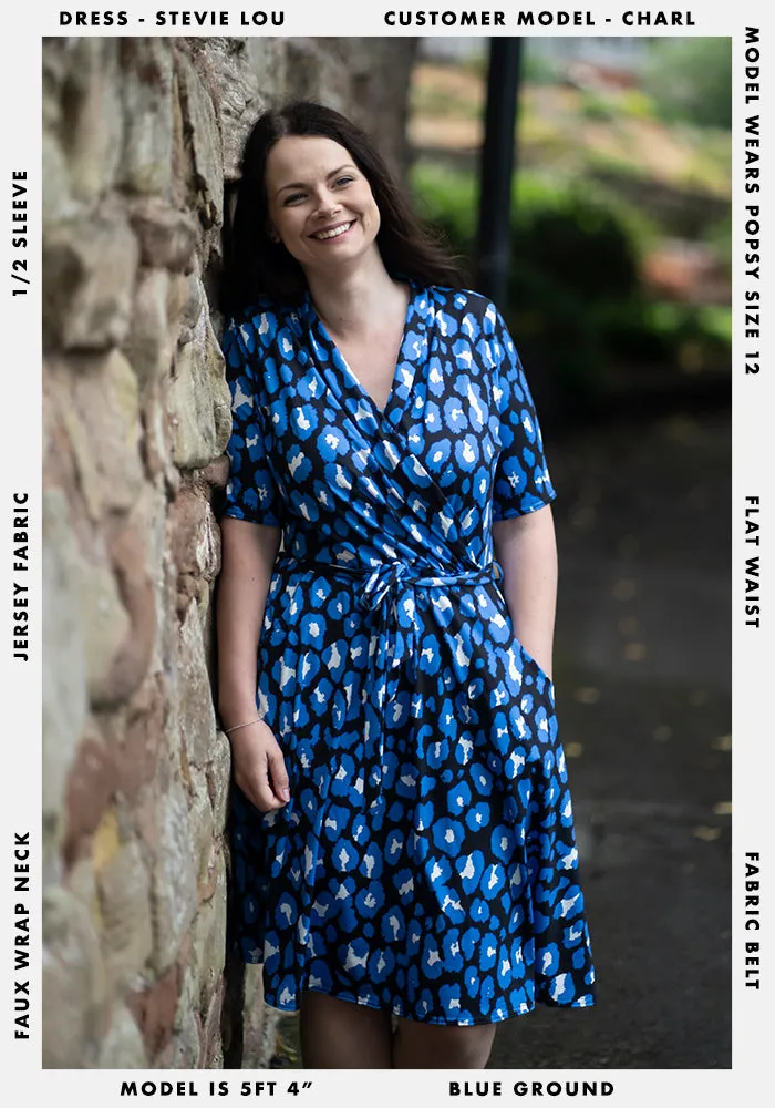 Stevie Lou Blue Animal Print Shawl Collar Wrap Dress